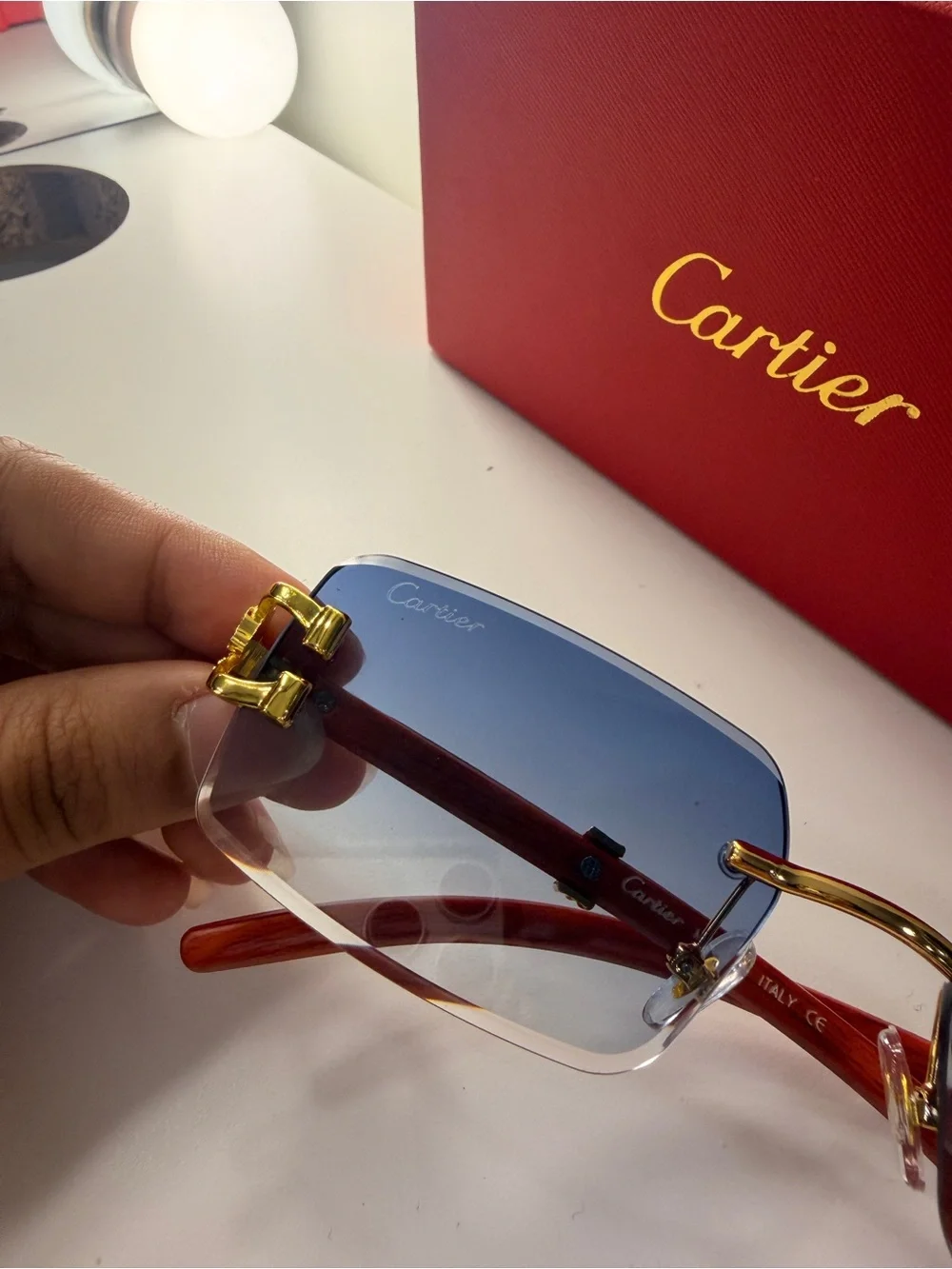 Cartier Men’s Rimless Sunglasses with Blue Gradient Lenses and Gold Accents